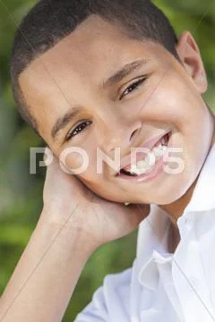 Happy african american boy child outside Stock Photos