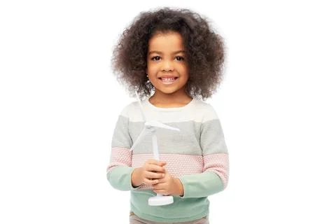 Happy african american girl with toy wind turbine Stock Photos