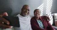 Happy African American Senior Couple Taking Selfie And Having Fun Stock Footage