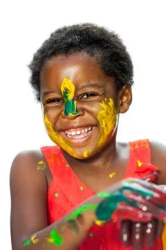 Happy african youngster with painted face. Stock Photos
