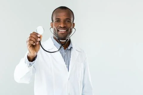 Happy afro american doc using his stethoscope Stock Photos