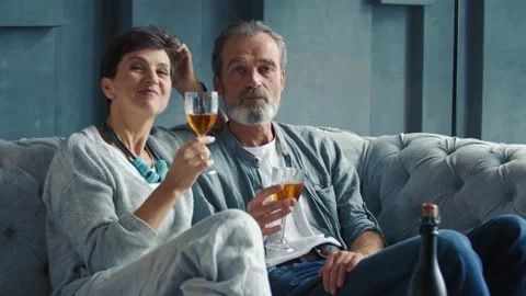 Happy aged couple drinking wine Stock Footage 147603104