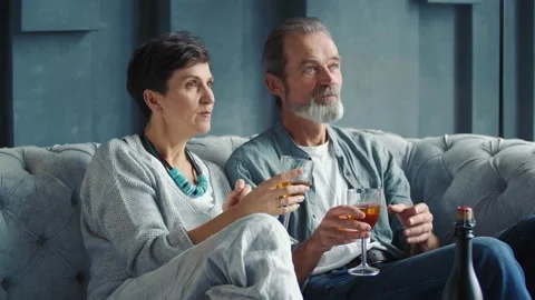 Happy aged couple drinking wine Stock Footage 147731159