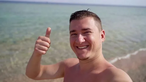 Happy and contented man looking at the camera and smiling Stock Footage 151423862