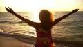 Happy and Free Woman Spreading Arms at Sunset in Slow Motion. HD Footage