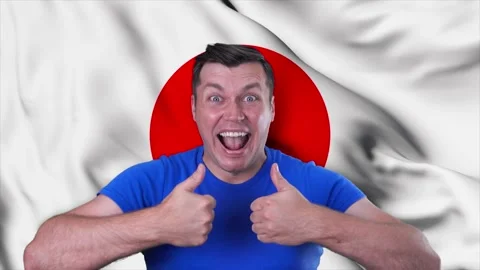 Happy and joyful man against the background of the flag of Japan, Stock Footage 147456853