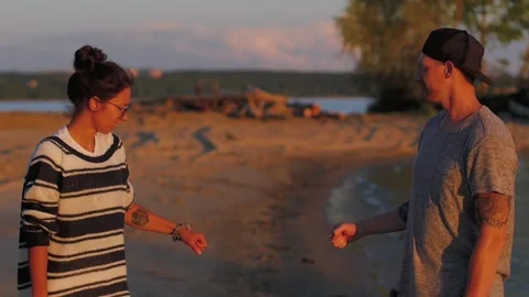 Happy and Romantic couple having fun on the beach at sunset. young couple Video stock 140776183