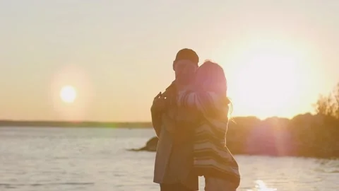 Happy and Romantic couple having fun on the beach at sunset. young couple 스톡 동영상 140776205
