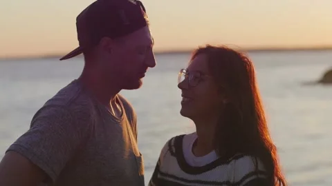 Happy and Romantic couple having fun on the beach at sunset. young couple Video stock 140776290