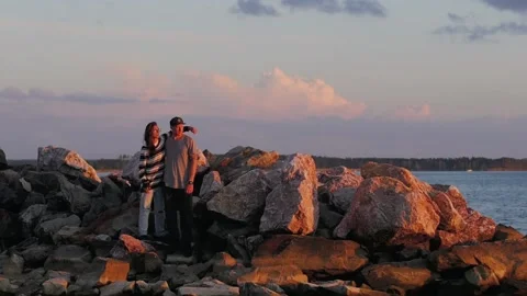 Happy and Romantic couple having fun on the beach at sunset. young couple Stock-Footage 140776385