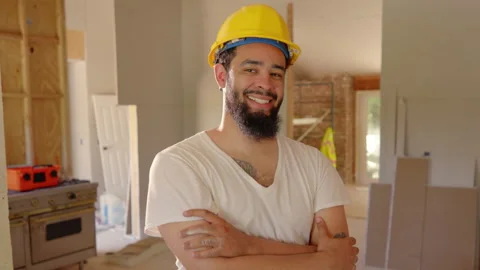 A Happy and Smiling Construction Worker in a Beautifully Renovated Interior Stock Footage 305781593