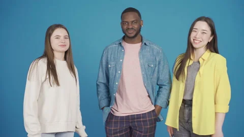 Happy and smiling multiethnic group of friends dancing, having fun  Stock Footage 228810249