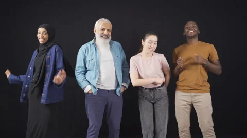 Happy and smiling multiethnic group of friends dancing, having fun. Stock Footage 228848665