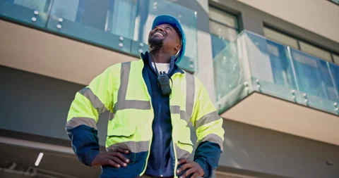 Happy, architect or black man with pride in city for building construction or Stock Footage 345301211
