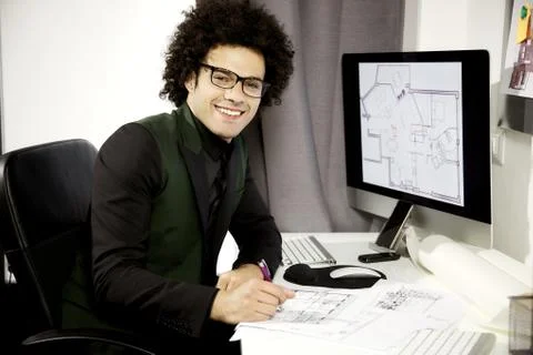 Happy architect at work in office smiling Stock Photos