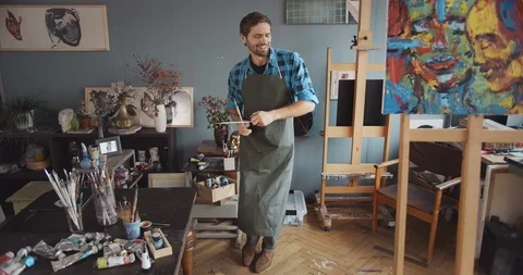 Happy Artist Dancing in Studio 库存影片 120128242