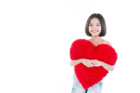 Happy Asian cute girl holding heart Stock Photos