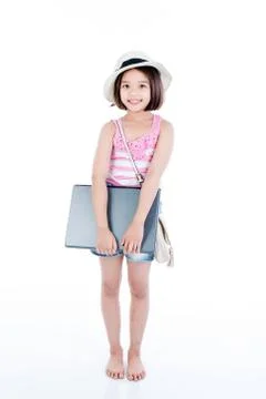 Happy asian girl holding laptop Stock Photos