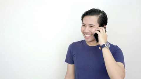 Happy Asian Man Calling With Smartphone On Studio White Background 4K Resolut Stock Footage 59949092