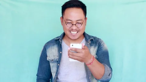 Happy Asian man  Stock Footage 167929403