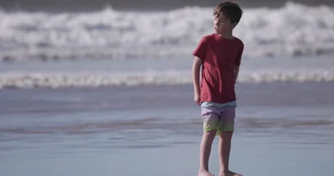 Happy Autistic Boy Running on Beach While Stimming with Excitement Stock Footage 339097828