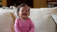Happy Baby Girl Gets Kiss From Her Mom, Smiles And Laughs Stock Footage