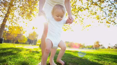 Happy Baby Taking First Steps Stock Footage 10721922