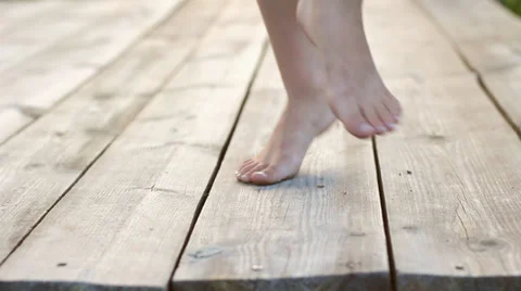 Happy Barefoot Kid Jumping Dancing on Wooden Playground HD Видео 34208672