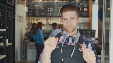 Happy barista dancing in a cafe Stock Footage 91036486