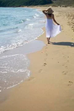 Happy beach stroll Stock Photos