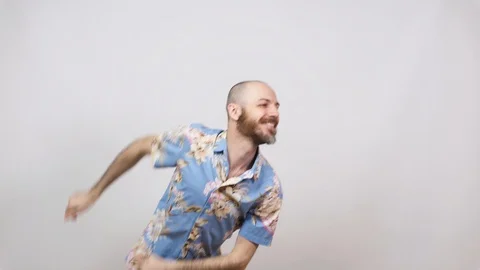 Happy bearded bald man dancing solo jazz on white background. Cheerful tourist Video stock 124843907