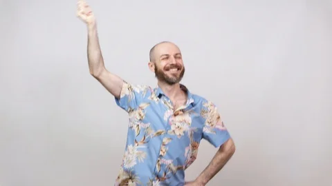 Happy bearded bald man dancing and having fun on white background. Cheerful Stock Footage 124843909