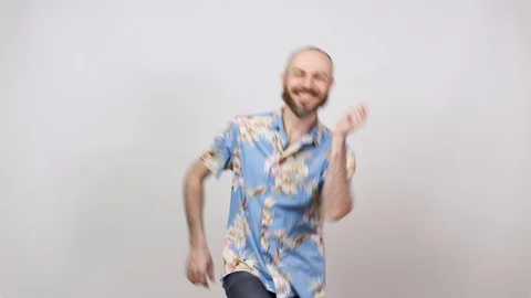 Happy bearded bald man having fun on white background. Joyful lucky tourist Video stock 125211511