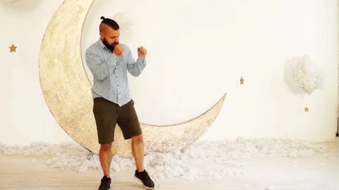 A happy bearded man is dancing. Stock Footage 88829430