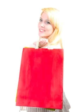 Happy beautiful blonde caucasian young woman with shopping bags Stock Photos