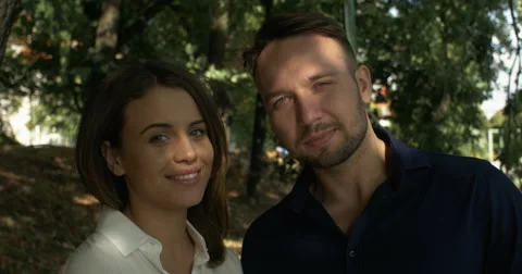 Happy beautiful couple looking at camera and smiling widely. Stock Footage 54676276