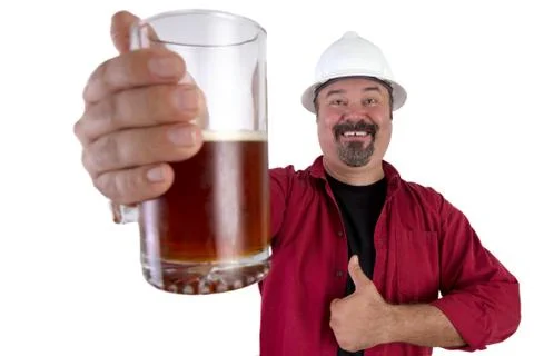 Happy beer drinking hard hat worker Stock Photos