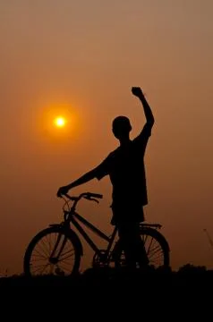 Happy with bicycle Stock Photos