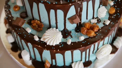 Happy Birthday cake. Child first birthday party. Chocolate icing cake Stock Footage 99740323