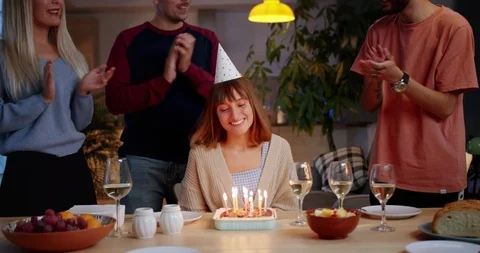 Happy Birthday of cute ginger Hispanic girl blowing out candles in celebration Stock Footage 123667564