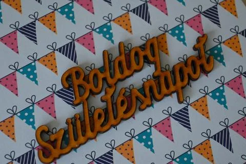 Happy birthday greeting on patterned background Foto stock