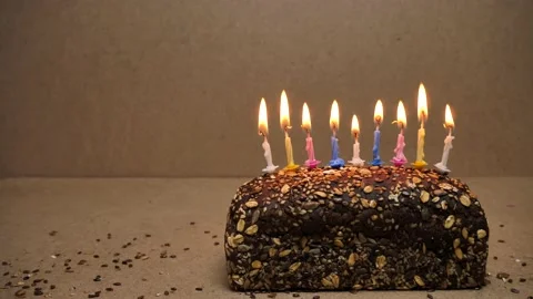 Happy birthday idea swedish bread with candles.Birthday cupcake, Happy holidays Stock Footage 184497136