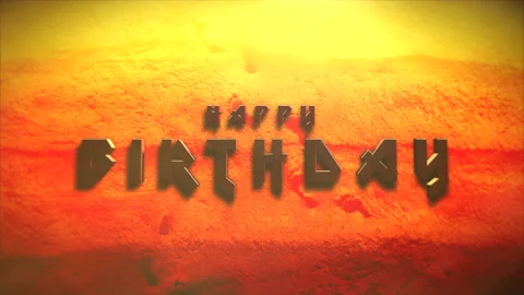 Happy Birthday text with sun rays on sand in desert Stock Footage 236179580