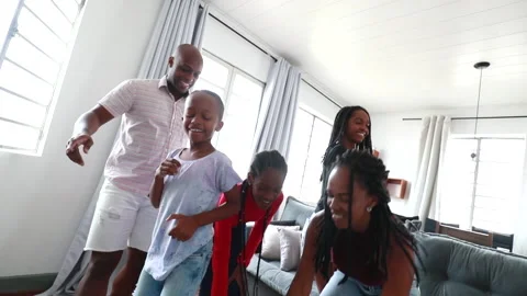 Happy black African family dancing Stock Footage