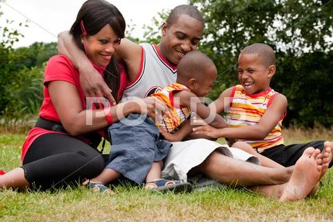 Happy black family enjoying their free day Stock Photos