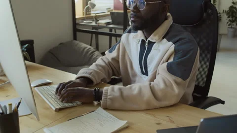 Happy Black Male Developer Cheering at Successful Code Test Stock Footage 293122528