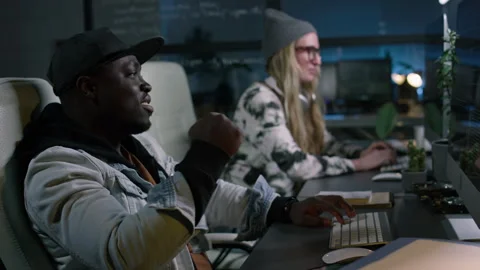Happy Black Male Programmer Finding Bug in his Code Stock Footage 273832524