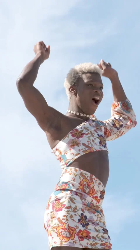 Happy black non-binary person dancing on street and enjoying freedom Stock Footage 242442474