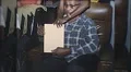 Happy Black Old Man African American Opens Birthday 60s Vintage Film Home Movie HD Footage