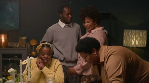 Happy Black People Greeting while Gathering around Table at Family Dinner Stock Footage 304666112